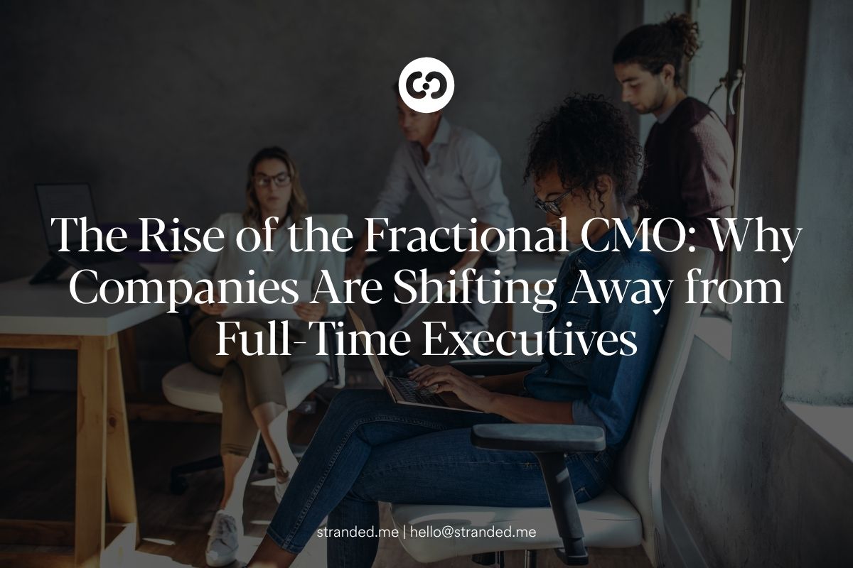 executive leadership team discussing fractional cmo strategy and business growth